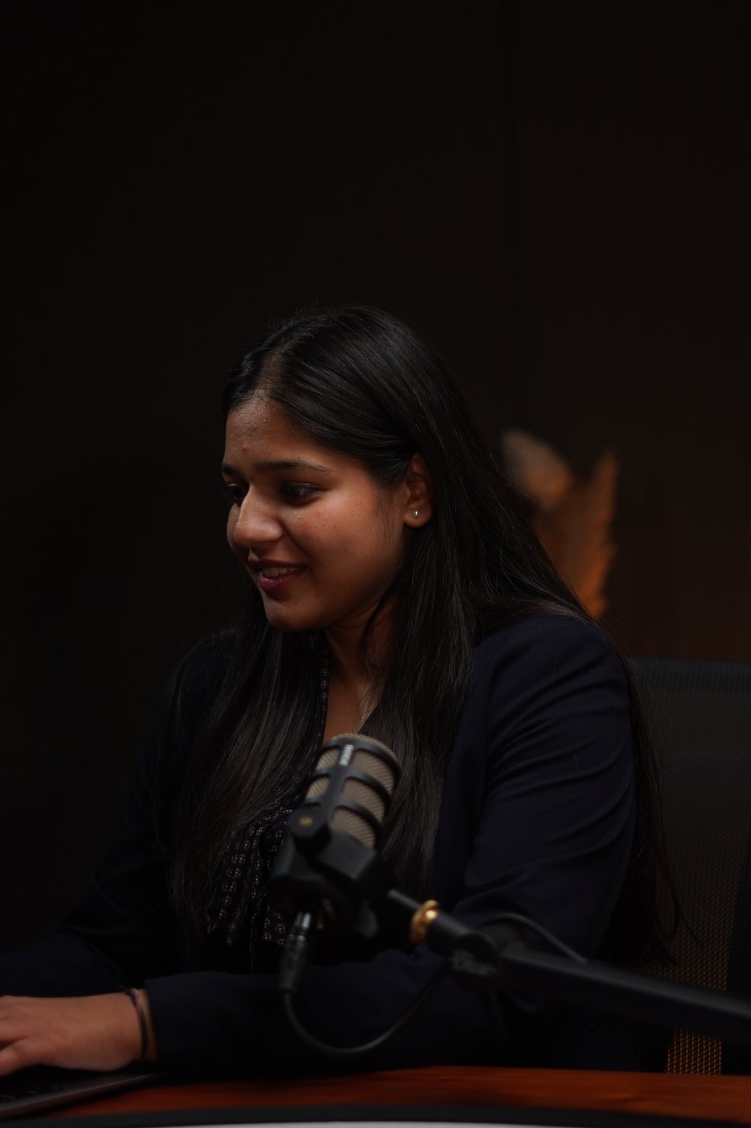 Surbhi Rawat at the microphone
